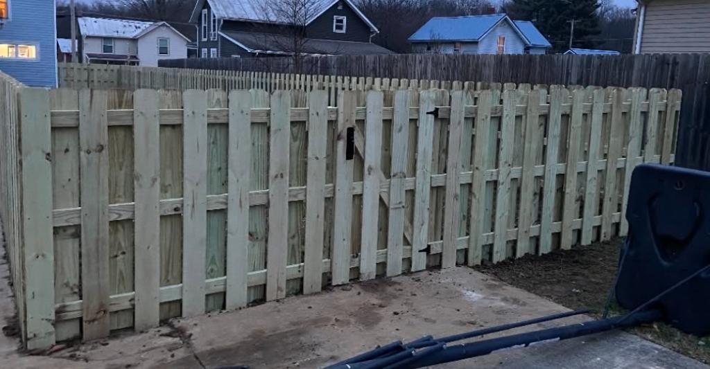 New wood privacy fence installation